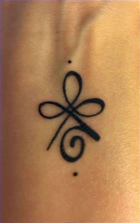 female strength symbol tattoo